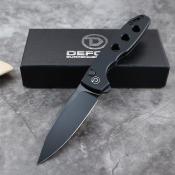 TD016BK Couteau Defcon Ghost Sheepfoot Sandvik 14C28N Lame Noire Manche Alu Noir Sécurité Button Lock - Livraison Gratuite
