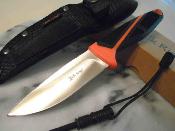 ER20023OR Poignard Elk Ridge Bushcraft Lame 3Cr13 Allume Feu Etui Nylon - Livraison Gratuite