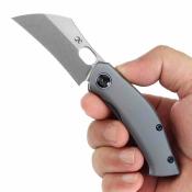 K2087A4 Kansept Osprey – Couteau Pliant Lame Wharncliffe Acier CPM-S35VN Manche Titane Bleu – Thumb Hole – Jonathan Shaw Design  