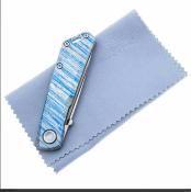 RS7071TC08 Couteau Real Steel Luna Boost | Lame Drop Point Acier Bohler N690 Satin | Manche Titanium Wind of Change Framelock - Livraison Gratuite