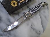 EE10B029GY Couteau ElitEdge Linerlock | Lame Drop Point Acier 440C Satin | Manche Black & Gray G10 Stainless Bolster - Livraison Gratuite