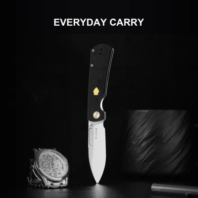 KIV4726A2 Couteau Kizer Retro Lame Drop Point Acier Nitro-V Manche G10 & Laiton Pivot Bearing Liner Lock - Livraison Gratuite