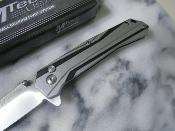 MT1109GY Couteau Tactical Mtech Button Lock Lame Acier 3Cr13 IKBS - Livraison Gratuite