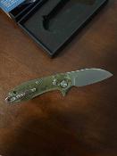 DTK3435GC Couteau Pliant Dreamtech | Lame Sheepsfoot Acier D2 Satin | Manche G10 Camo Axis Lock - Livraison Gratuite