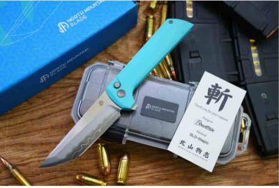 NMB2405SB North Mountain Blade Chop 2 – Couteau Tanto Lame SLD-Magic San Mai Manche G10 Bleu Ciel Buttonlock – Livraison Gratuite