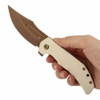 B1089C5 Couteau Orion Flipper | Lame Acier Nitro-V Rose Gold Drop Point | Manche G10 Ivory White | Liner Lock | Livraison Gratuite