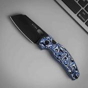KIV348829BSA1 Couteau Kizer Sheepdog C01C | Lame Sheepsfoot Acier Nitro-V Black PVD | Manche Blue Vortex Micarta Button Lock - Livraison Gratuite