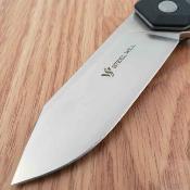 SMGF3101 Steel Will Tenet 2 SWF31-01 – Couteau Lame Acier D2 Satin Manche G10 Noir Linerlock Clip Ambidextre – Livraison Gratuite