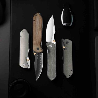 Ki4784A4 Kizer Harpoon Fold | Couteau Lame Drop Point Acier 3-Couches Composite | Manche Titane & Norplex UltreX™ Micarta Frame Lock - Livraison Gratuite