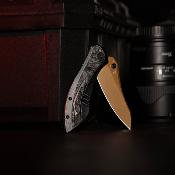 TVJM08RGM Couteau Trivisa Rhino-RG Lame Acier M390 Gold PVD Manche Titanium + Carbon Fiber | Framelock | Livraison Gratuite