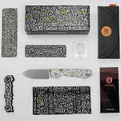 VOSA2933 Couteau Vosteed Raccoon | Lame Acier 14C28N Drop Point Stonewash | Manche Plaquettes G10 Doodle Monster | Top Liner Lock | Livraison Gratuite