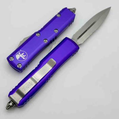 MCT23211PU Microtech UTX-85 D/E OTF – Couteau Automatique Double Action Lame Dague Acier Premium Serrated – Manche Alu Violet USA – Livraison Gratuite