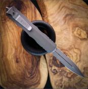 MCT22511APNC Couteau OTF Microtech Dirac D/E 225-11APNC | Lame Dague Apocalyptic Part Serrated | Manche Alu USA - Livraison Gratuite