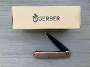 G4057 Gerber Affinity – Couteau Pliant Lame Acier D2 Drop Point Black, Manche Cuivre/Acier, Frame Lock – Livraison Gratuite