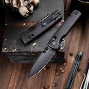 TVTY29BM14 Trivisa Sabretooth BM | Crossbar Lock | Lame Drop Point Acier 14C28N | Manche Micarta Black Roulements Céramique - Livraison Gratuite