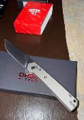 DTK4032TG Couteau Dreamtech | Lame Acier VG-10 Drop Point | Manche Plaquettes Gray Anodized Titanium | Crossbar Lock | Livraison Gratuite