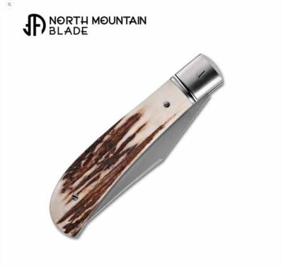 NMB2531ATL Couteau North Mountain Blade Lanny Thin | Lame Clip Point Acier SLD-Magic | Manche Corne de Cerf Slipjoint - Livraison Gratuite